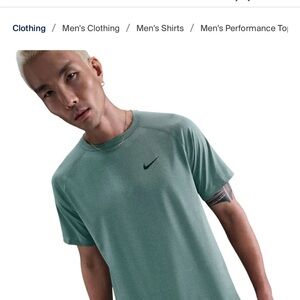 Nike Dri fit men xl 
Bluish green color